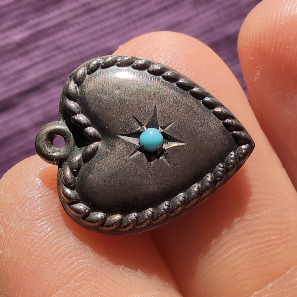 Antique sterling silver puffed heart charm